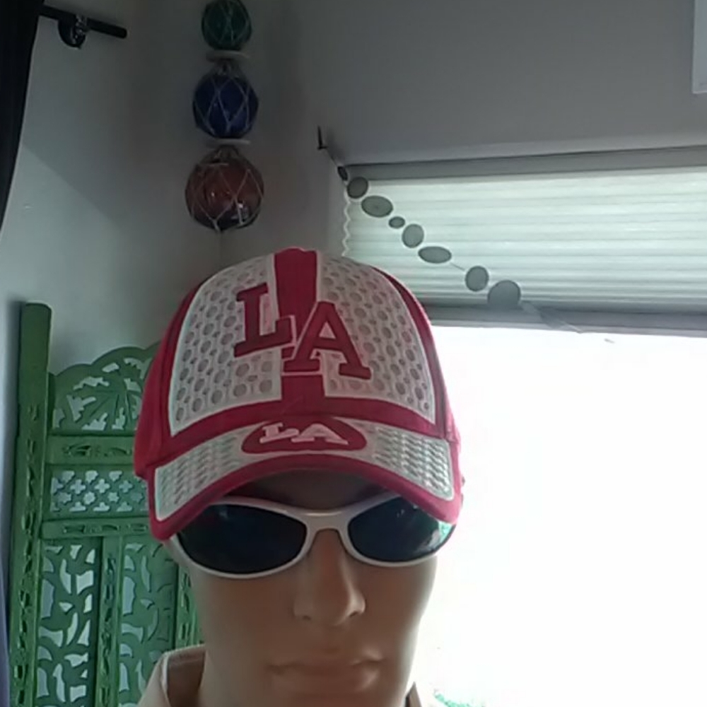 L A baseball hat red and white